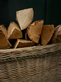 kiln-dried logs in basket